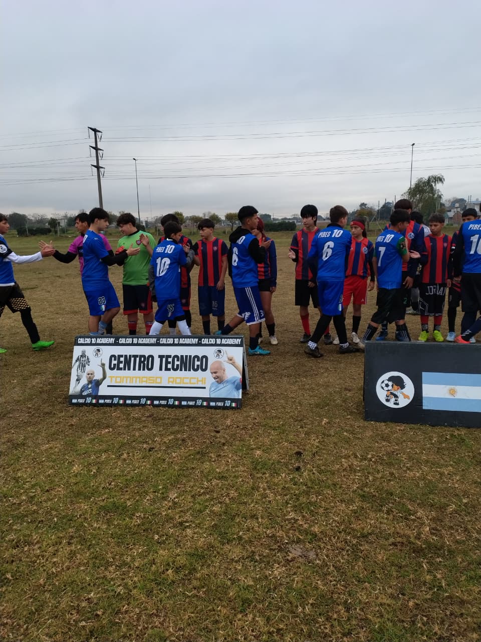 Saludo entre equipos